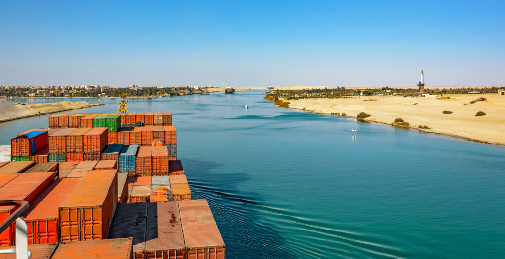 Industrial container ship passing through Suez Canal