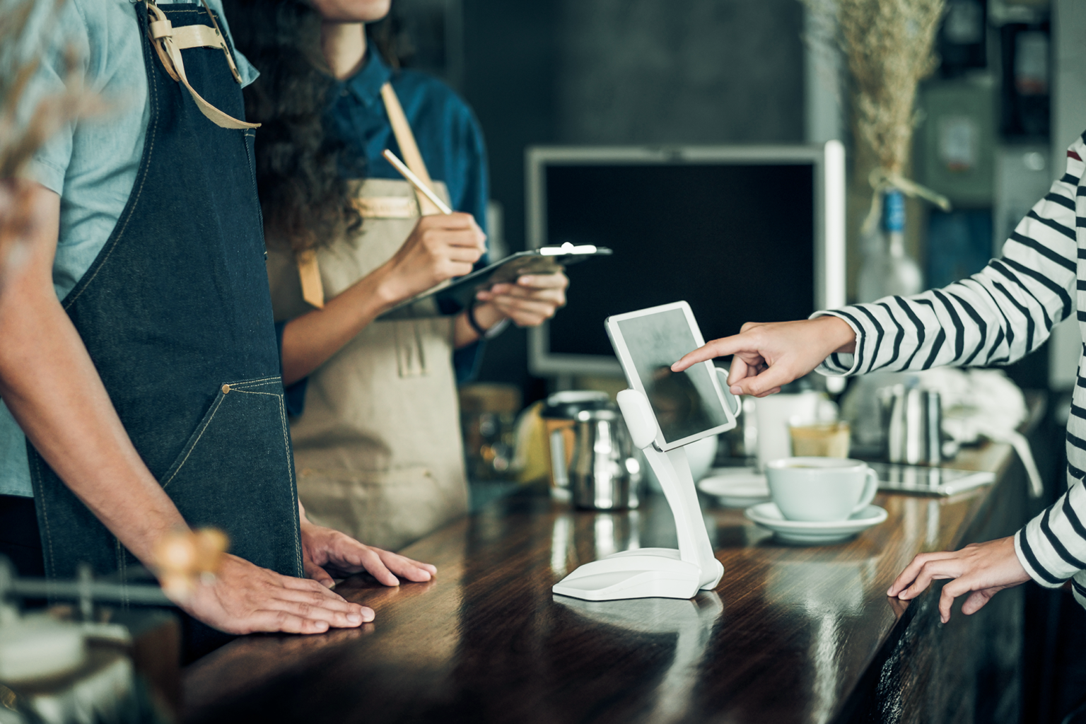 Customer using wifi connected device to pay for order