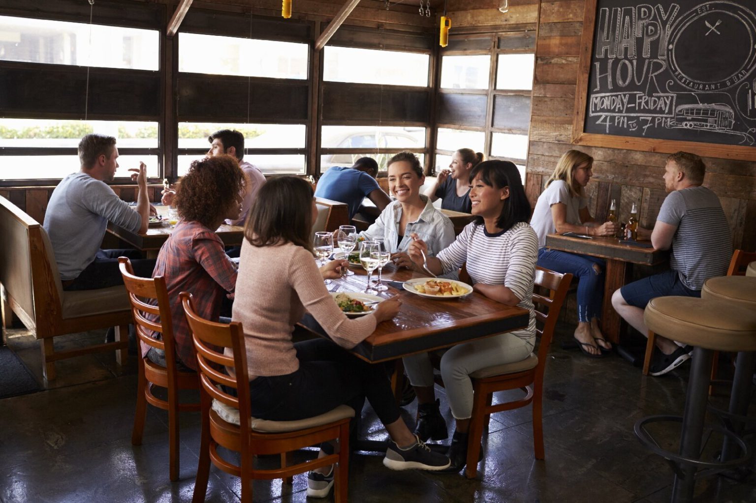 Busy restaurant with happy customers